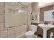 Basement bathroom with shower/tub combo and pedestal sink at 3188 S County Road 137, Bennett, CO 80102