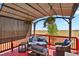 Relaxing pergola covered deck with seating and fire pit at 3188 S County Road 137, Bennett, CO 80102