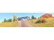 Blue house, red barn, and long driveway at 3188 S County Road 137, Bennett, CO 80102