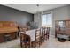 Elegant dining room with a large table and vintage furniture at 3188 S County Road 137, Bennett, CO 80102