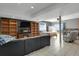 Finished basement with living area, kitchenette, and bedroom at 3188 S County Road 137, Bennett, CO 80102