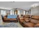 Relaxing living room with two leather sofas and ample space at 3188 S County Road 137, Bennett, CO 80102
