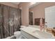 Small bathroom with shower/tub combo and single vanity at 3188 S County Road 137, Bennett, CO 80102