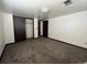 Large bedroom with double closets and neutral walls at 11742 E Jewell Pl, Aurora, CO 80012