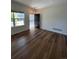 Spacious living room with hardwood floors and lots of natural light at 6043 S Waco St, Aurora, CO 80016