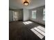 Bright bedroom with large windows and walk-in closet at 6043 S Waco St, Aurora, CO 80016