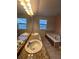Double vanity bathroom with granite countertop at 6043 S Waco St, Aurora, CO 80016
