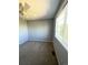 Grey bedroom with window and ceiling fan at 6043 S Waco St, Aurora, CO 80016