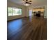 Open concept kitchen with island and modern appliances at 6043 S Waco St, Aurora, CO 80016