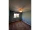Blue bedroom with ceiling fan and carpet at 6043 S Waco St, Aurora, CO 80016