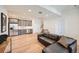 Finished basement with kitchenette and comfortable seating at 3534 Running Deer Dr, Castle Rock, CO 80109