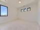 Bright and airy bedroom with large window and carpet flooring at 3534 Running Deer Dr, Castle Rock, CO 80109