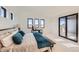Main bedroom with private balcony access and stunning views at 3534 Running Deer Dr, Castle Rock, CO 80109