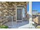 Inviting front entrance with stone accents and a welcoming mat at 249 S Old Hammer St, Aurora, CO 80018