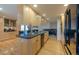 Modern kitchen with light wood cabinets, granite counters, and stainless steel appliances at 4557 Tanglewood Trl, Boulder, CO 80301