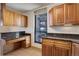 Kitchen with granite countertops and built-in desk at 460 S Marion Pkwy # 1353, Denver, CO 80209