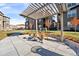 Outdoor patio area with seating and fire pit at 8421 Galvani Trl # E, Littleton, CO 80129