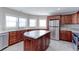 Modern kitchen with granite countertops and stainless steel appliances at 41321 E 88Th Ave, Bennett, CO 80102