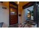 Inviting front door entry to charming home with stone pathway at 408 E 1St Ave, Denver, CO 80203