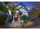 Beautiful two-story home with a welcoming porch and landscaping at 408 E 1St Ave, Denver, CO 80203