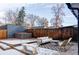 Spacious backyard with hot tub and patio furniture at 2731 California St, Denver, CO 80205