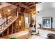 Stylish living room with exposed brick, wood floors, and modern furniture at 2731 California St, Denver, CO 80205