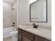 Clean bathroom with a single vanity, shower, and toilet at 323 Josef Cir, Fort Lupton, CO 80621