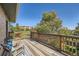 Private deck with wooden railings, offering a relaxing outdoor space at 2854 Eliot St, Denver, CO 80211
