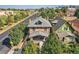 Brick house with gray roof, front porch, and landscaping, seen from above at 2854 Eliot St, Denver, CO 80211