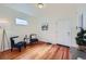 Living room featuring hardwood floors and a view of the entryway at 2854 Eliot St, Denver, CO 80211