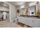 Modern bathroom with double vanity and large walk-in closet at 20 N Wilcox St # 218, Castle Rock, CO 80104