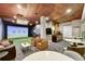 Community golf simulator room with lounge seating at 20 N Wilcox St # 218, Castle Rock, CO 80104