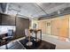Well-lit home office with a desk and two chairs at 2100 16Th St # 606, Denver, CO 80202