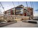 Brick building with modern architecture and bridge at 2100 16Th St # 606, Denver, CO 80202