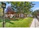 Landscaped backyard with pergola and walkway at 30176 E 166Th Ave, Brighton, CO 80603