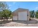 Large workshop with double doors and shelving at 30176 E 166Th Ave, Brighton, CO 80603