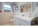 Clean bathroom with white vanity and tiled shower at 209 10Th Ave, Idaho Springs, CO 80452