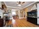 Living room with hardwood floors and view into dining room at 209 10Th Ave, Idaho Springs, CO 80452