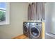 Laundry room with washer, dryer, and extra storage at 209 10Th Ave, Idaho Springs, CO 80452