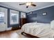 Bright bedroom featuring hardwood floors and ample natural light at 209 10Th Ave, Idaho Springs, CO 80452