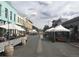 Outdoor seating areas and shops line a pedestrian-friendly street at 209 10Th Ave, Idaho Springs, CO 80452