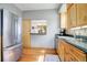 Kitchen with stainless steel appliances and a view into the dining area at 209 10Th Ave, Idaho Springs, CO 80452