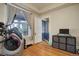 Home gym with exercise bike and access to exterior at 209 10Th Ave, Idaho Springs, CO 80452