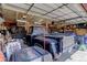Spacious garage with ample storage and two classic cars at 209 10Th Ave, Idaho Springs, CO 80452