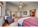 Large bedroom with access to upper floor and additional rooms at 934 S Perry Park Rd, Sedalia, CO 80135