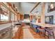 Spacious kitchen with island, ample counter space, and large windows at 934 S Perry Park Rd, Sedalia, CO 80135