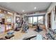Well-equipped home gym in the basement, featuring various exercise machines and weights at 934 S Perry Park Rd, Sedalia, CO 80135