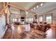 Expansive living area with hardwood floors, high ceilings and large windows at 934 S Perry Park Rd, Sedalia, CO 80135