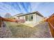 Backyard view showing patio and fenced area at 25626 E Maple Ave, Aurora, CO 80018