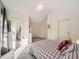 Spacious bedroom with plaid bedding and a mirrored door at 1300 Main St, Georgetown, CO 80444